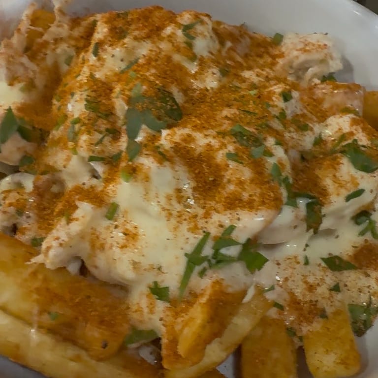Indulge in Our Cheesesteak